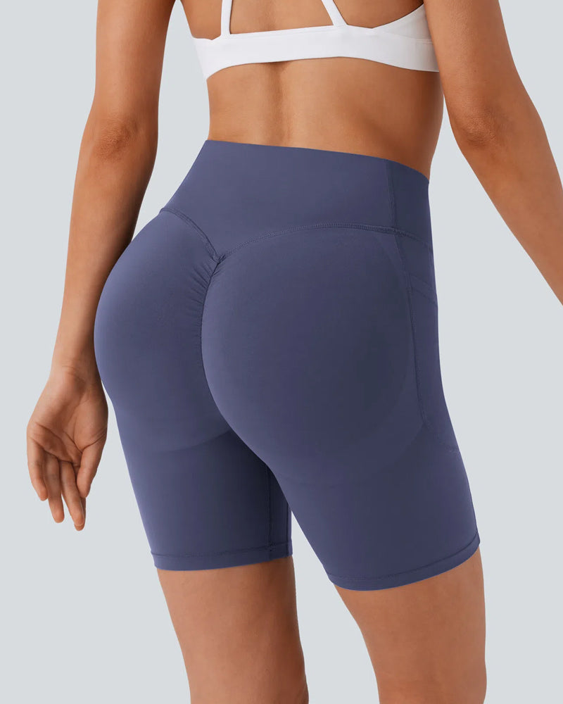 Pantaloncini sportivi modellanti push-up a vita alta con tasche laterali