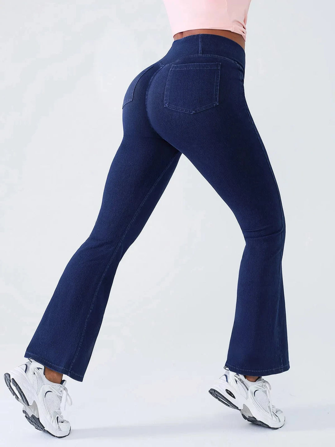 Leggings modellanti effetto jeans con vita incrociata e tasche laterali
