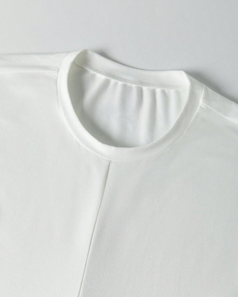 Maglia girocollo con spalle scese e schiena incrociata