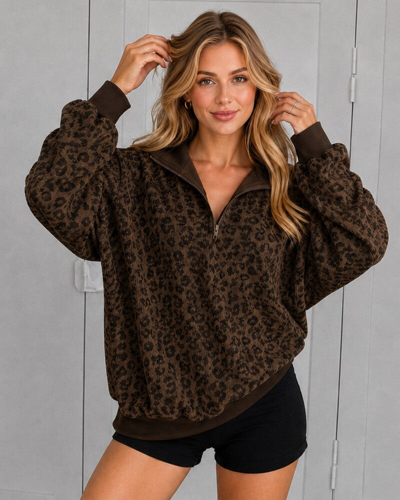 Pullover oversize leopardato con mezza zip
