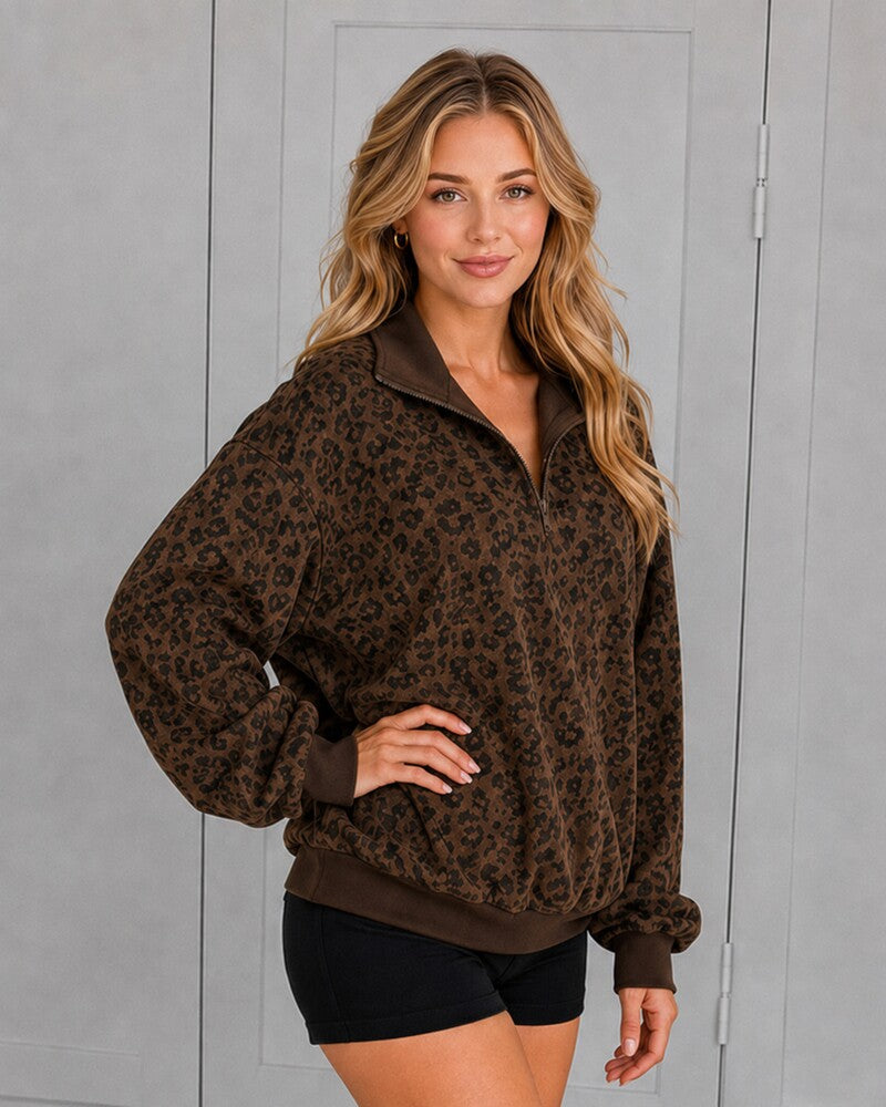 Pullover oversize leopardato con mezza zip